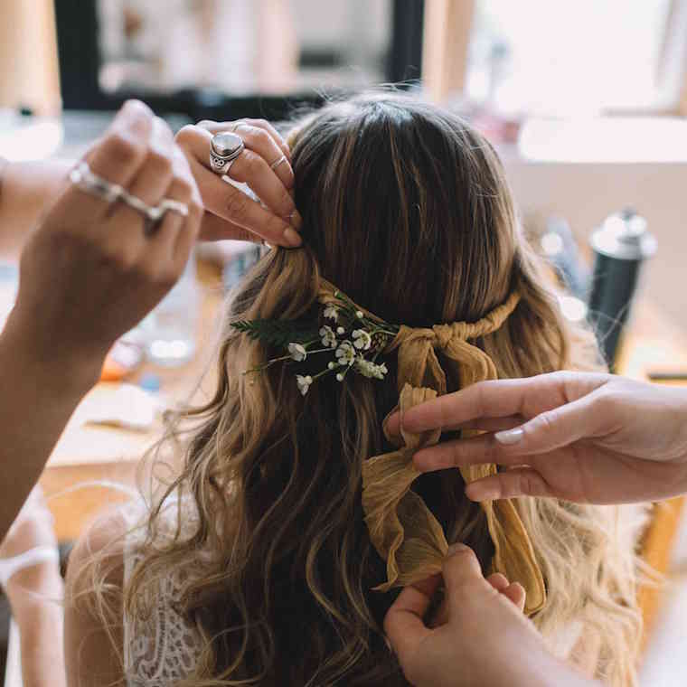 30 stunning ways to wear wedding hair flowers a ribbon and buds min