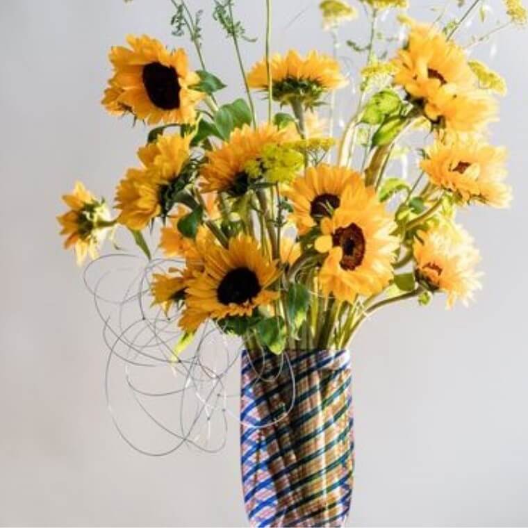 A vase of sunflowers. Flower fashion