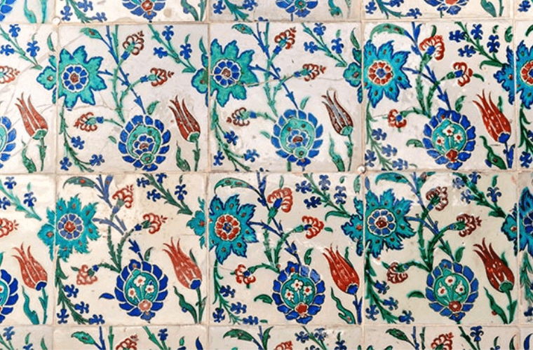 Tulip period design on tiles in blue, red, and queen