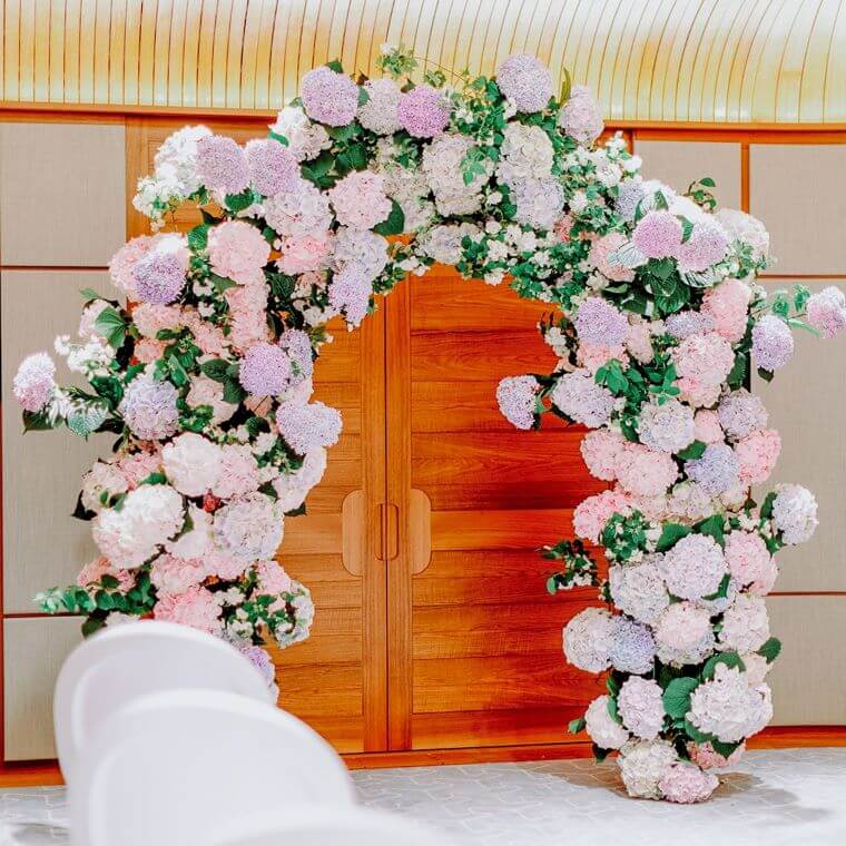 Flower arch by blooming haus