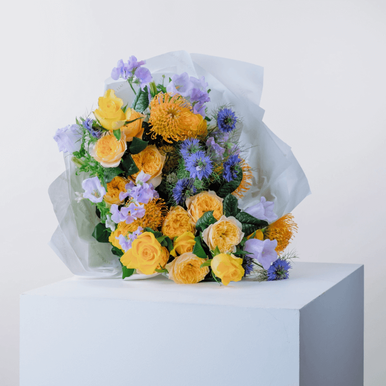 Bouquet with pincushion flowers, sweet peas, roses and nigellas