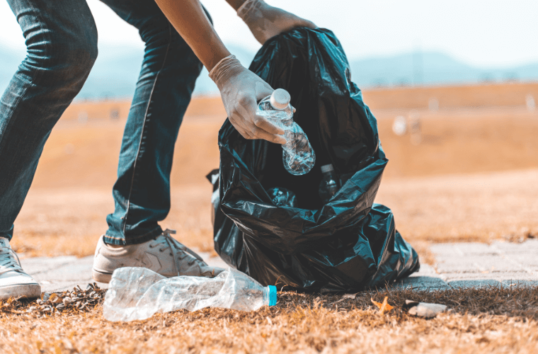 A man picking up litter