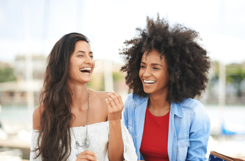 Two women laughing