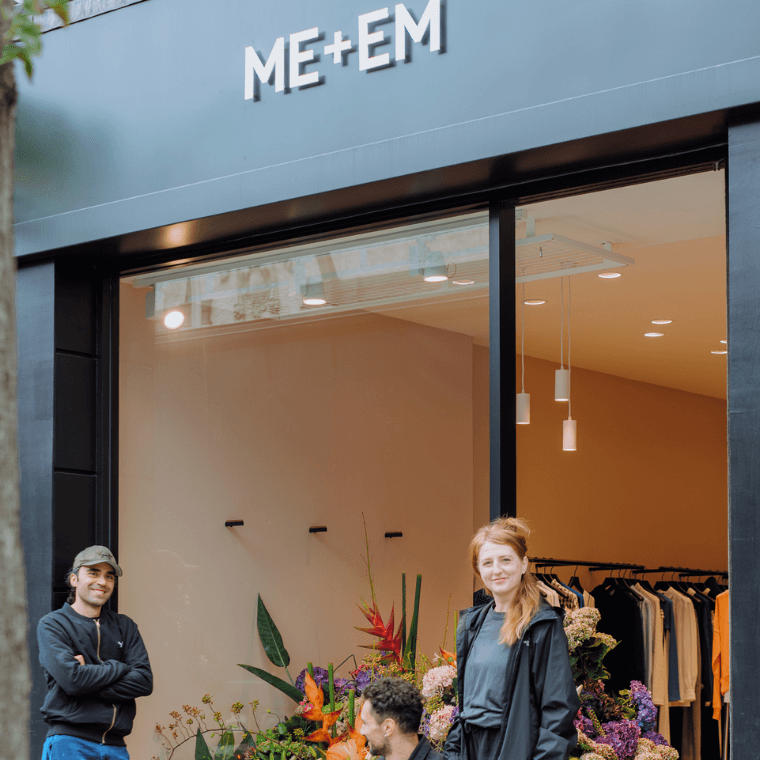 The team of three from blooming haus outside their floral window display at me + em