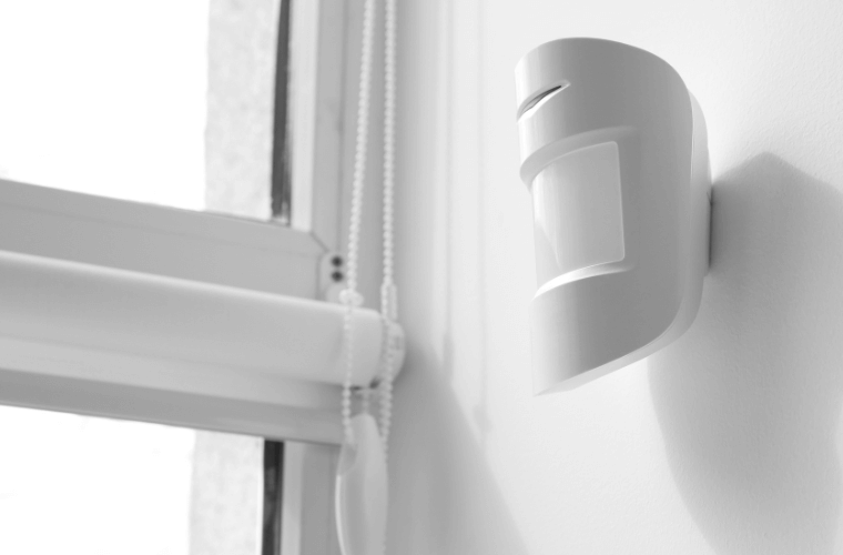 An occupancy sensor attached to a wall