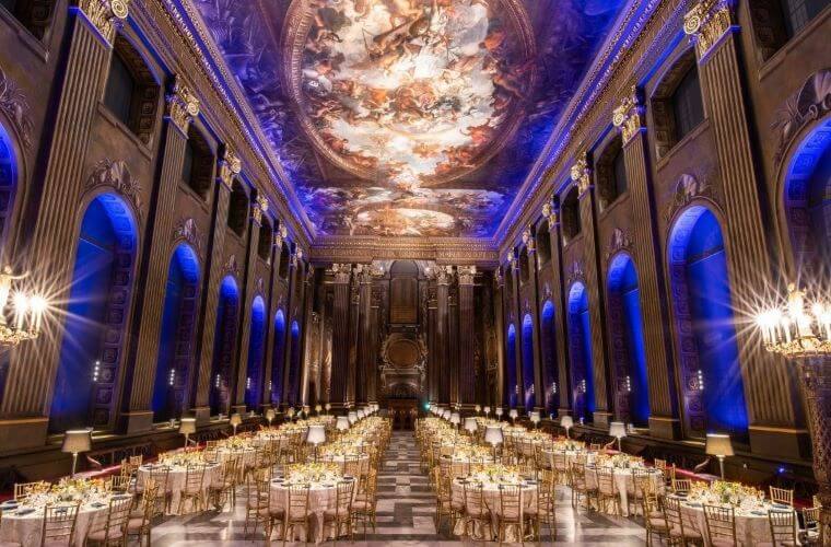 The painted hall at greenwich set with tables for an event