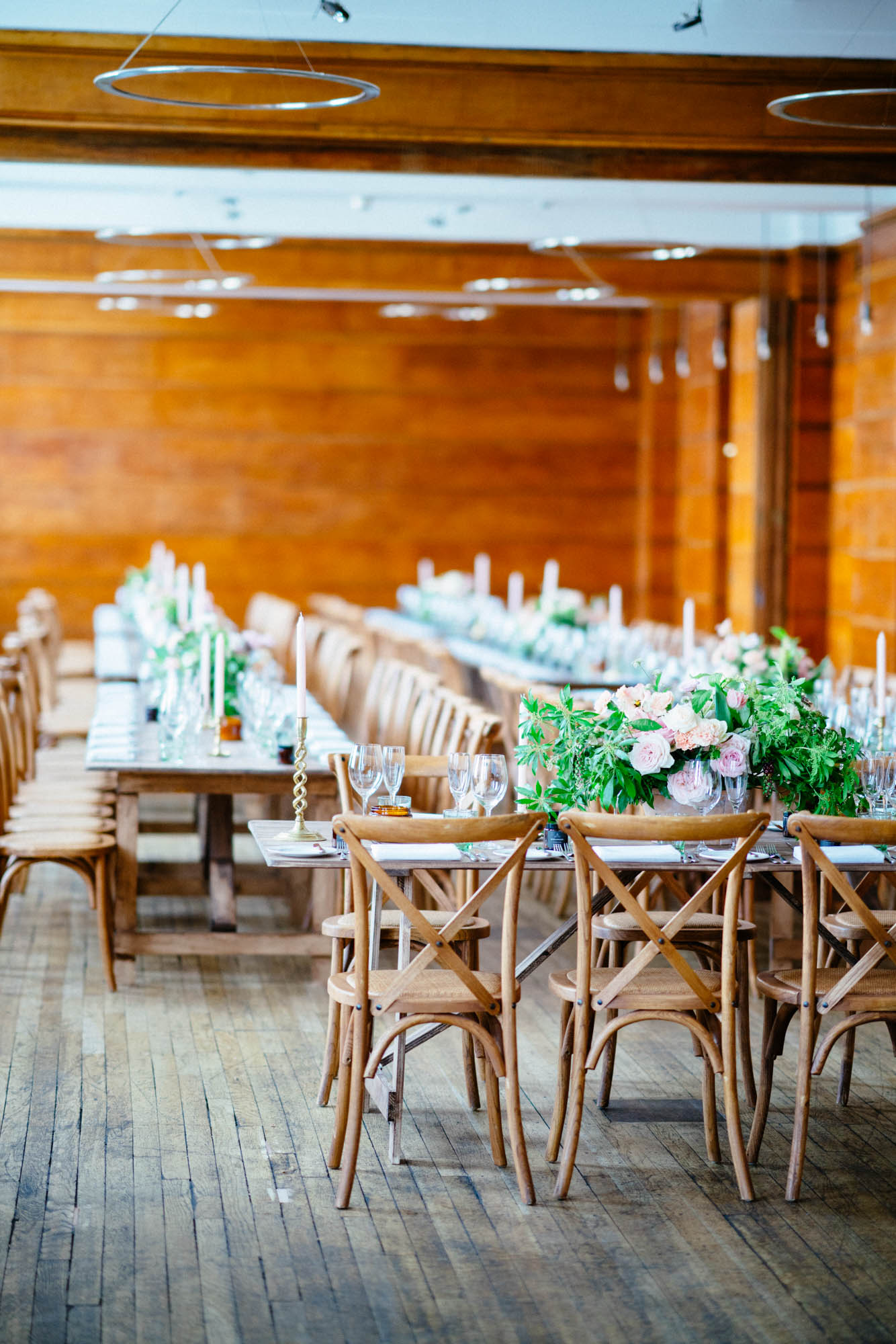 Town hall hotel wedding flower arrangements green and blush flowers