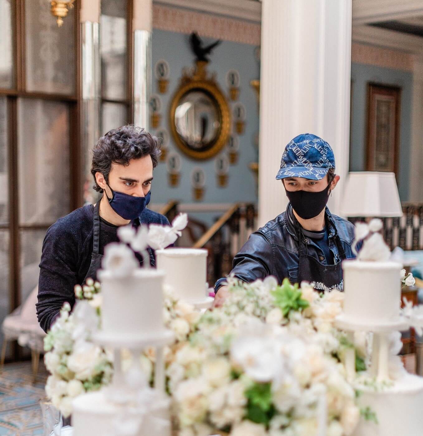 Blooming haus completing floral wedding designs on the day