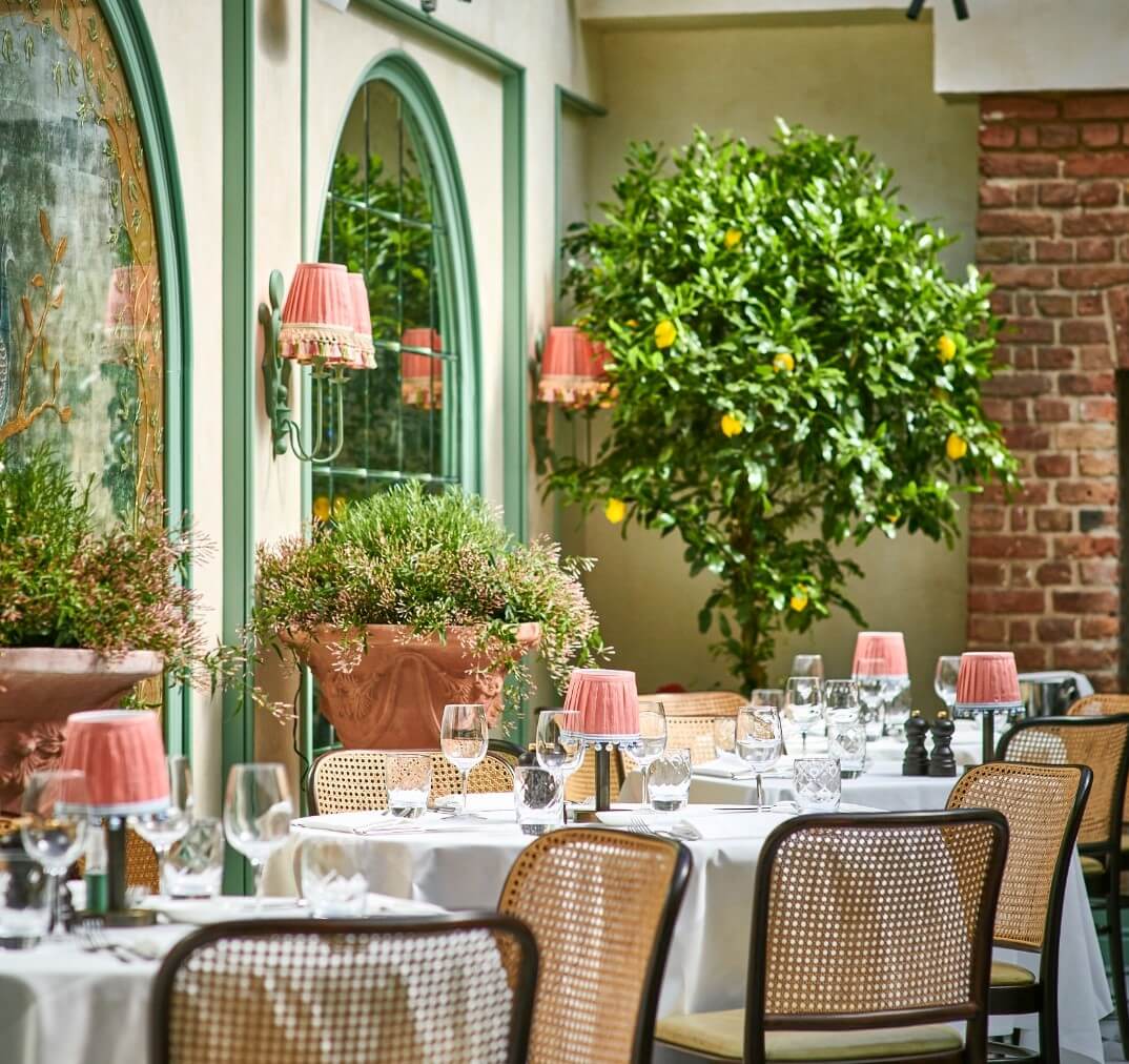 Round tables set for a private event at daphne's